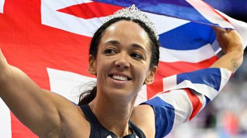 Katarina Johnson-Thompson celebrates after winning Olympic silver at Paris 2024
