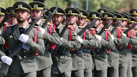 EPA Iranian soldiers parade during the annual Army Day celebration at a military base in Tehran, Iran